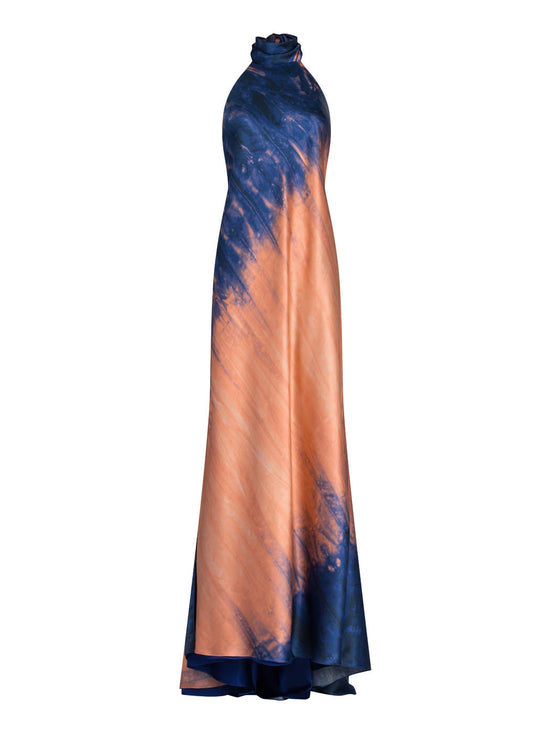 Elegant sleeveless Sherry Dress Mediterranean Coral Blue gown with a halter neckline, featuring a gradient blue and orange tie-dye design, displayed against a white background.