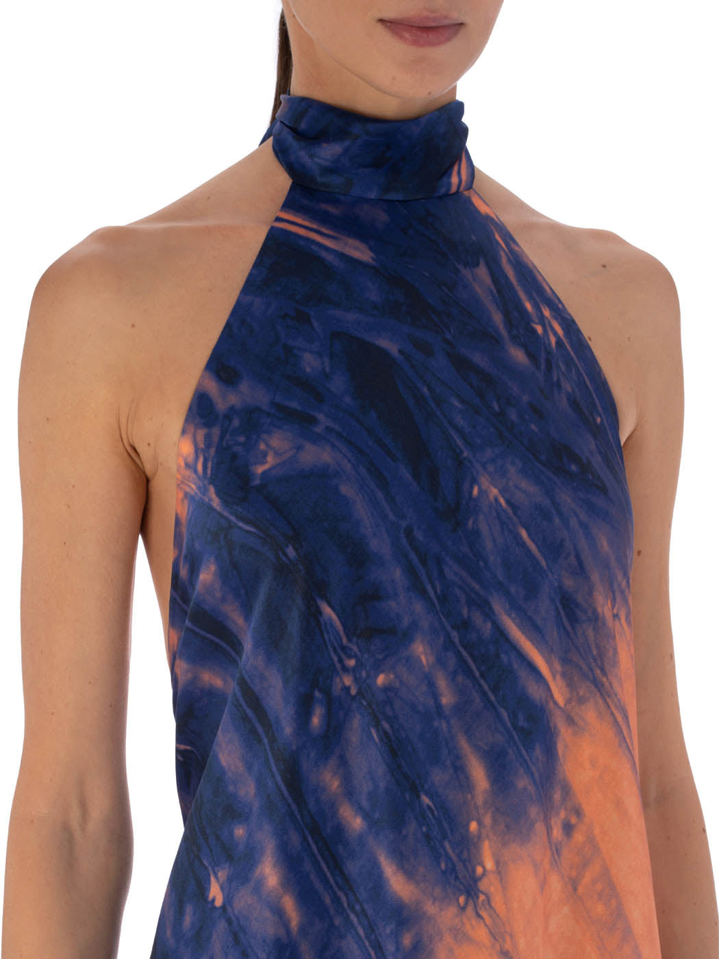 Elegant sleeveless Sherry Dress Mediterranean Coral Blue gown with a halter neckline, featuring a gradient blue and orange tie-dye design, displayed against a white background.
