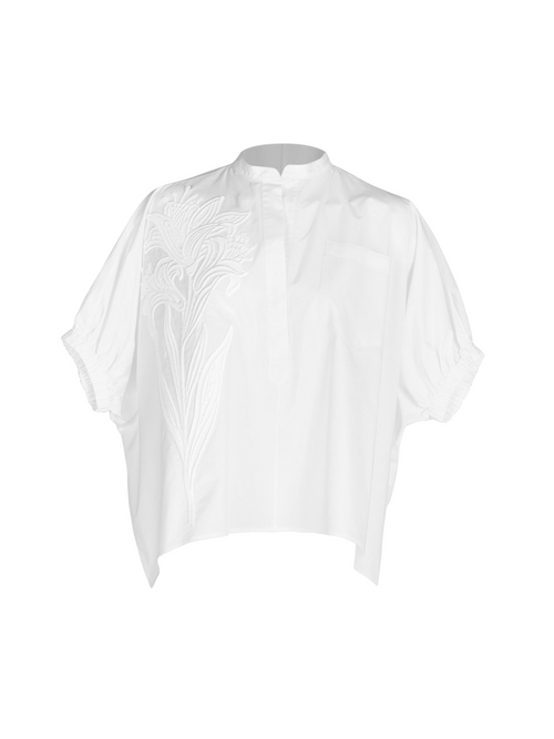 A Susanne Blouse White featuring a high collar and intricate floral embroidery on the left side.