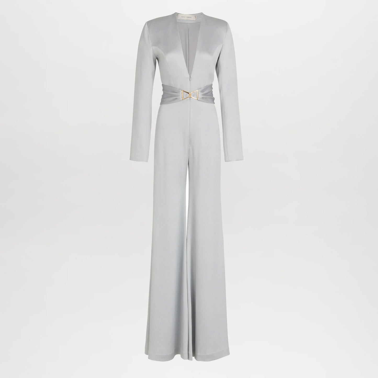 The Taboa Jumpsuit Gray features long sleeves, wide legs, a deep V-neckline, and a cinched waist with a decorative metallic buckle and front belt for a flattering silhouette.