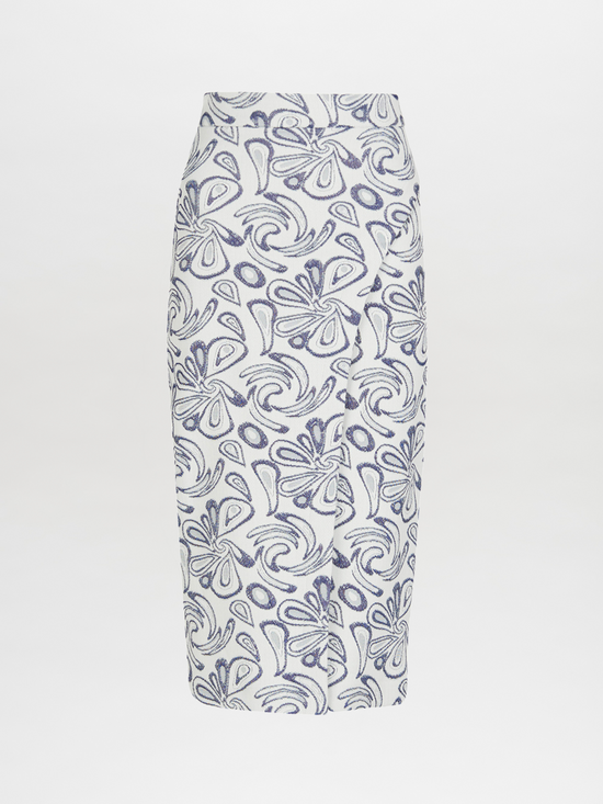 Introducing the Thora Skirt Navy Swirls, meticulously crafted from premium gabardine fabric. This white pencil skirt features an abstract navy blue and black pattern set against a pristine backdrop, perfectly tailored for elegance and style.