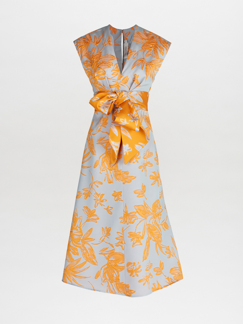 A Toledo Dress Apricot Silver with a grey floral print. Arrives in days.