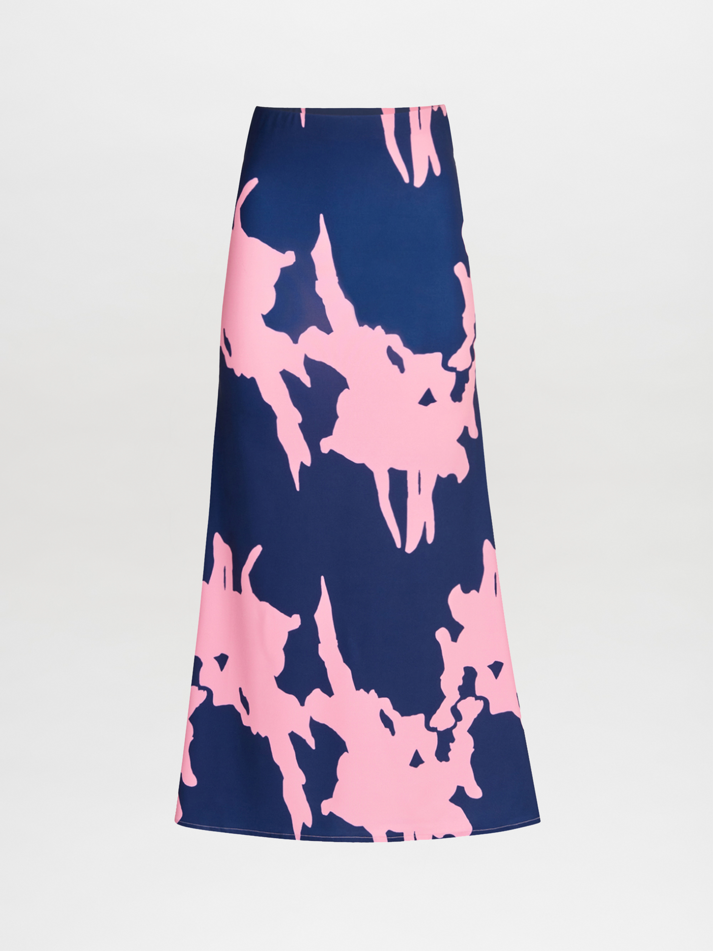 The Trieste Skirt Pink Navy showcases an A-line silhouette, highlighting a pink abstract print set against a dark blue background, displayed on a white backdrop.