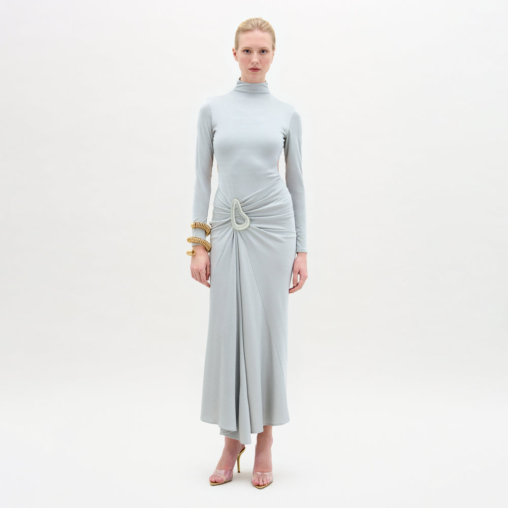 A woman wearing the Venus dress midi-dress in color Silver on a white background.