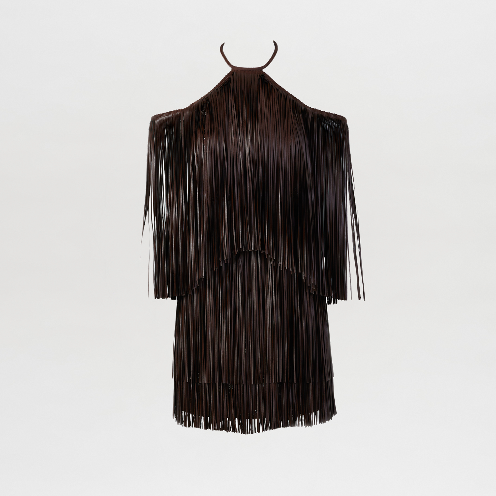 The Vercelli Dress is a black, sleeveless leather mini dress featuring long fringe strands across the entire garment, shown against a plain white background.
