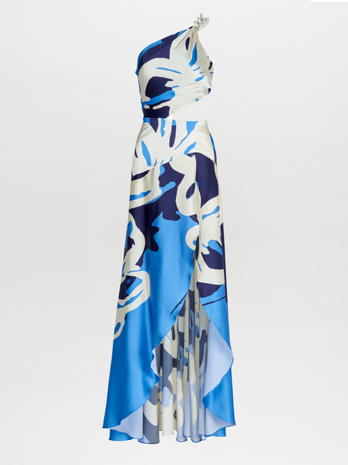 A Whitney Dress Celeste Bloom with an abstract pattern and a one-shoulder silhouette.