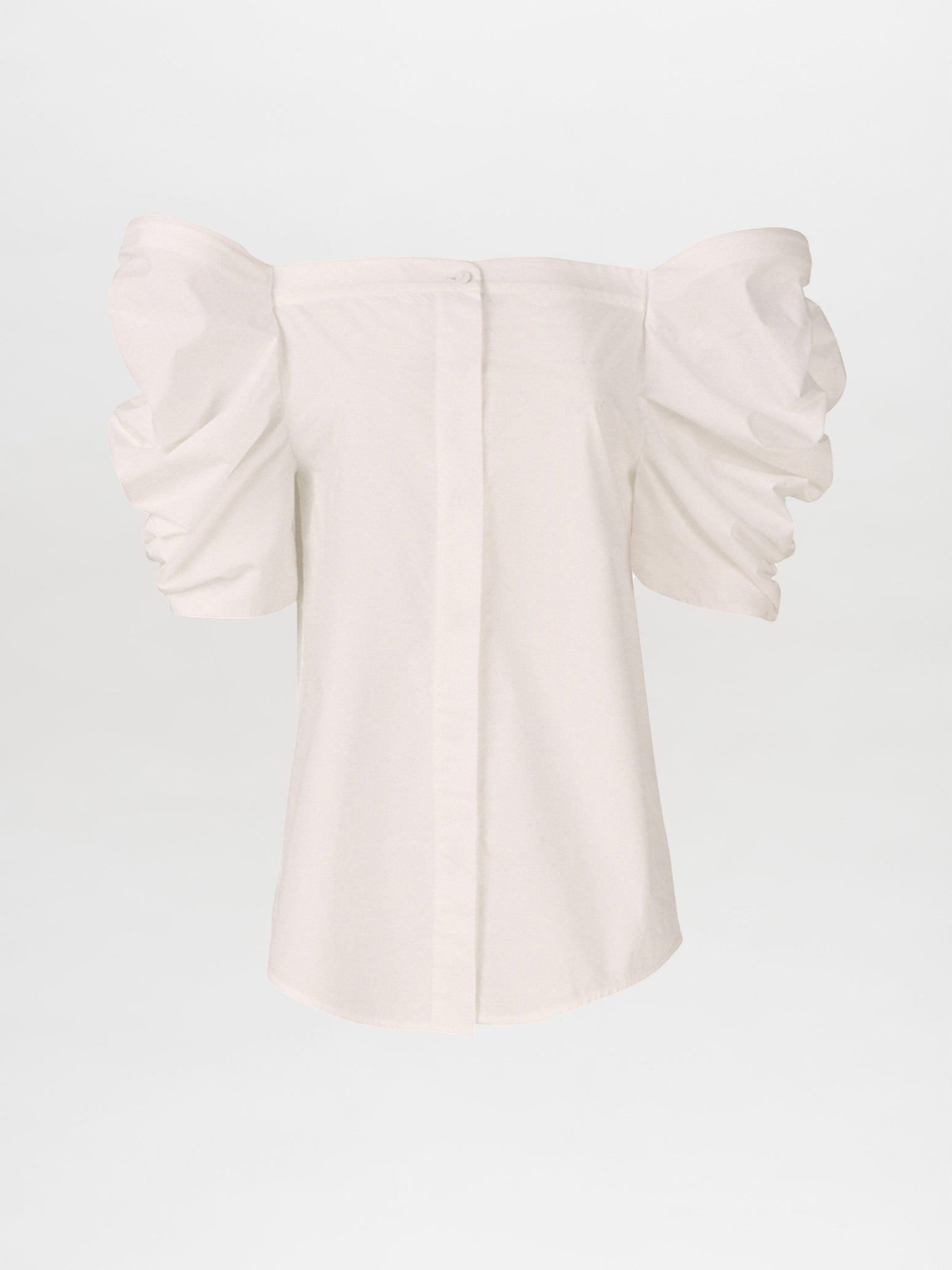 The Wynn Blouse White with voluminous puff sleeves and a central button closure on the front, crafted from lightweight cotton.