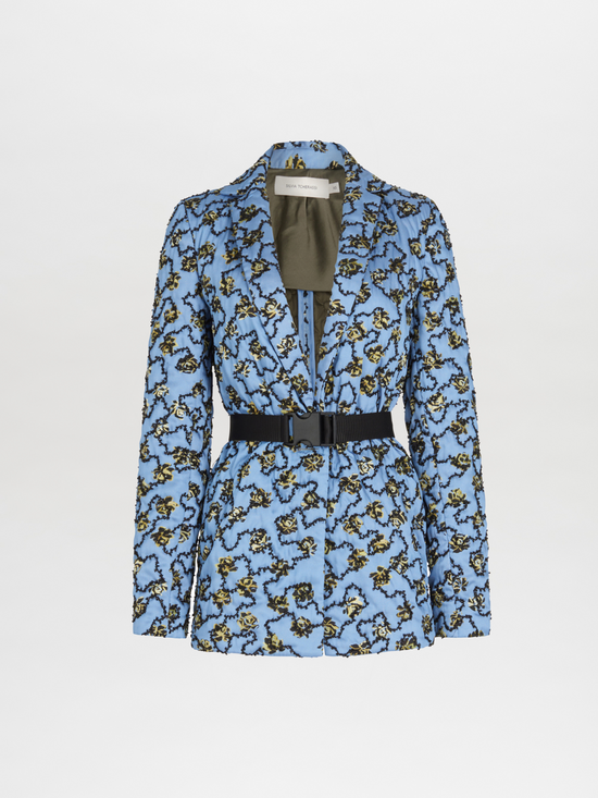 A Yarah Jacket Periwinkle with an animal print belt.