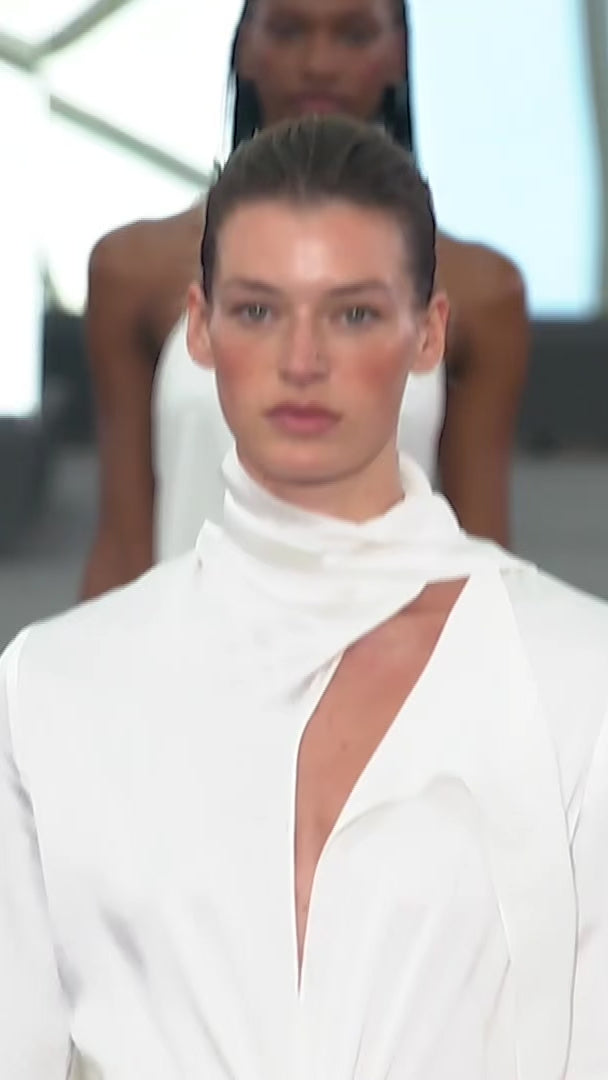 Women walking the runway wearing the Sue Dress in color White .