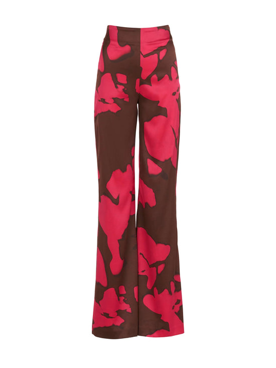 A woman's pink and brown Andie Pant Fuchsia Cacao with a high-waisted silhouette.