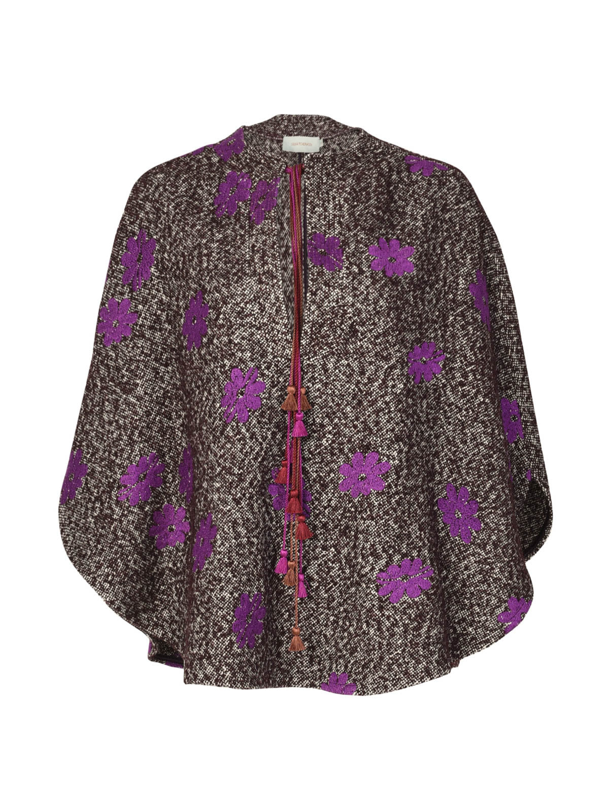 The Casilde Cape Violet is a brown textured cape adorned with violet gray floral embroidery, featuring a front tie closure with multi-color tassel details.