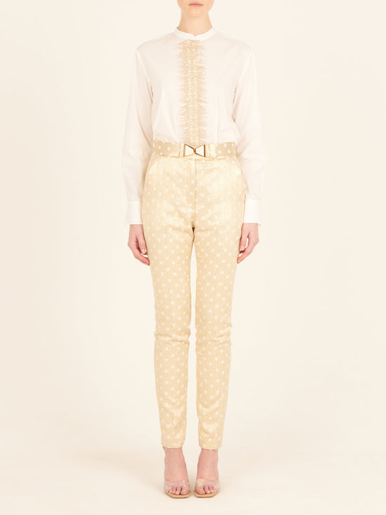 A sophisticated Isabel Blouse White with gold embroidery.