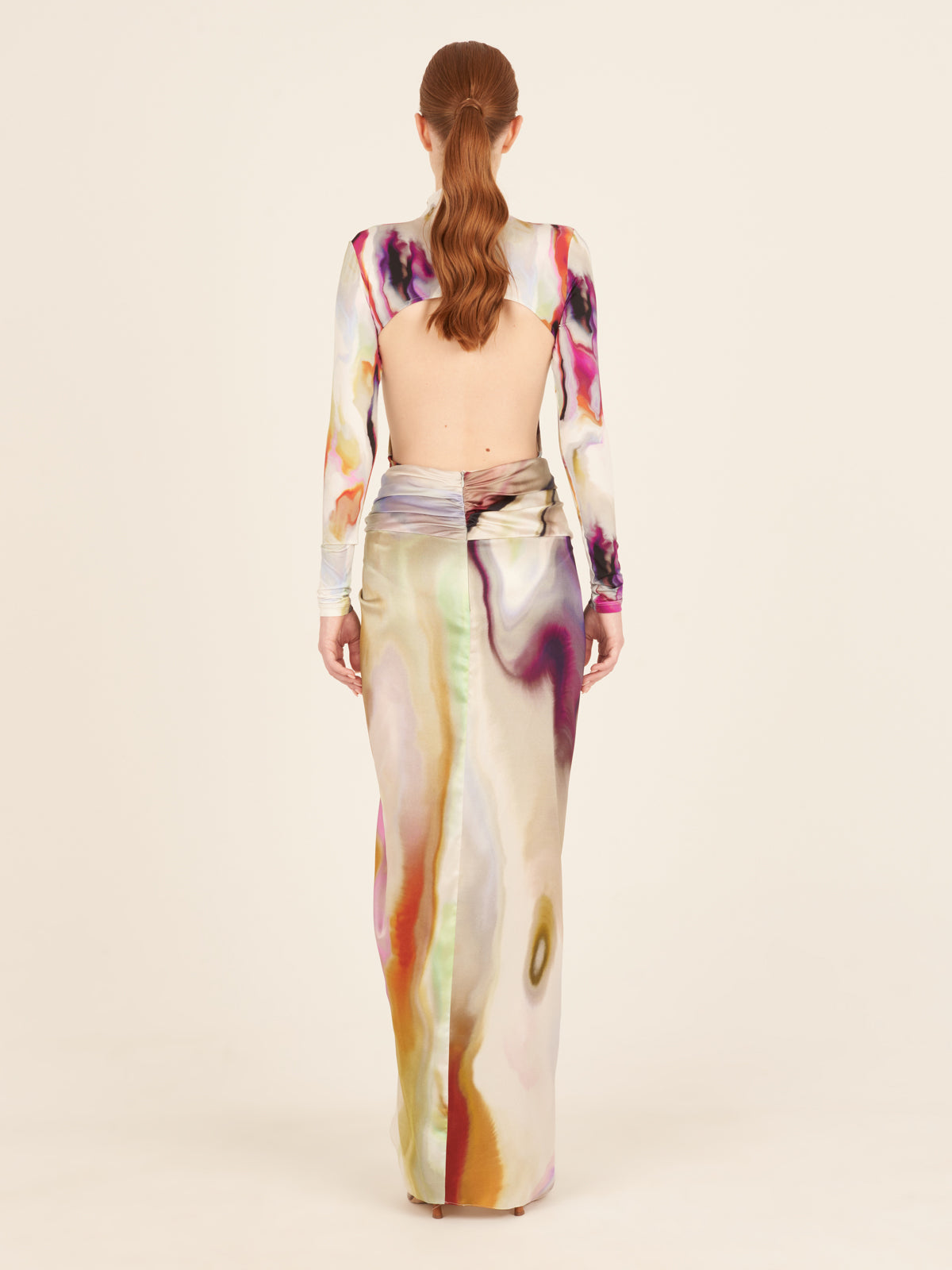 A women's Lady Skirt Iridescent Marble with a high waist and multi colored floral print.