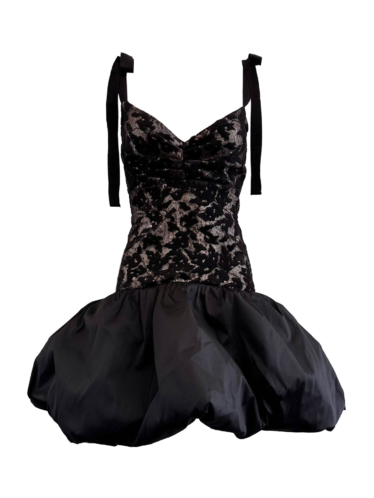 A Marguerite Dress Black with lace and bows.