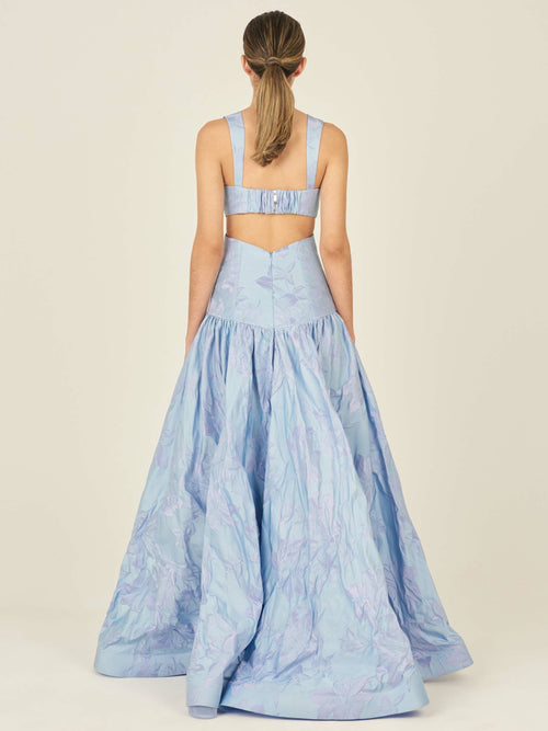 Allegra Dress French Lilac with thick shoulder straps, a fitted bodice, and a full, ankle-length skirt with a floral pattern.