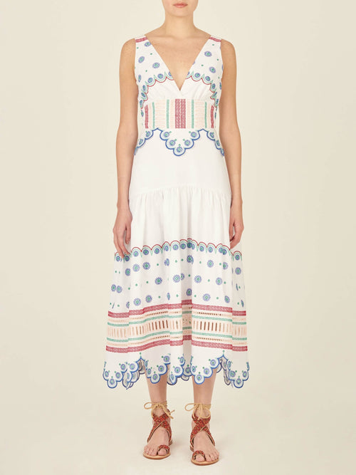 A Biset Dress White Blue with colorful embroidered details.