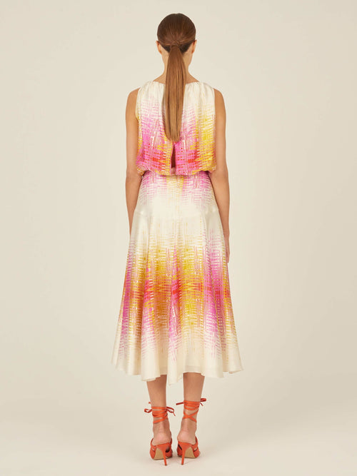 The Daila Dress White Digital features a white and pink abstract pattern in midi length.
