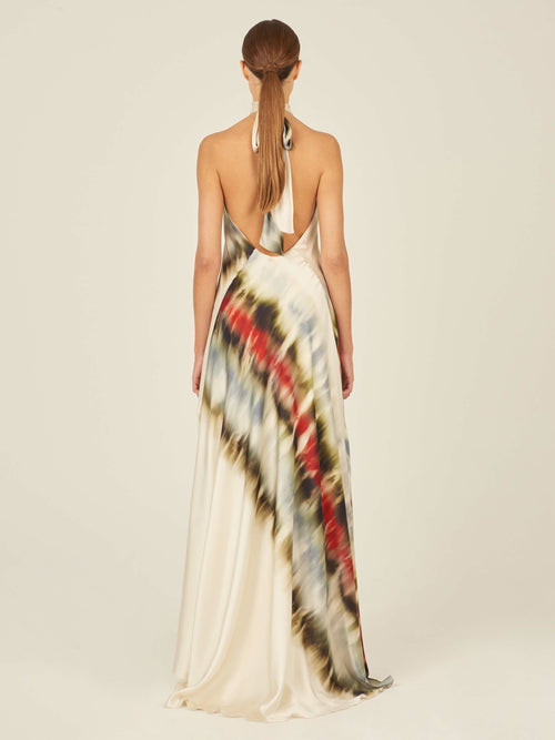 The Sheryl Dress Multi Linear features a tie dye pattern on silk fabric.
