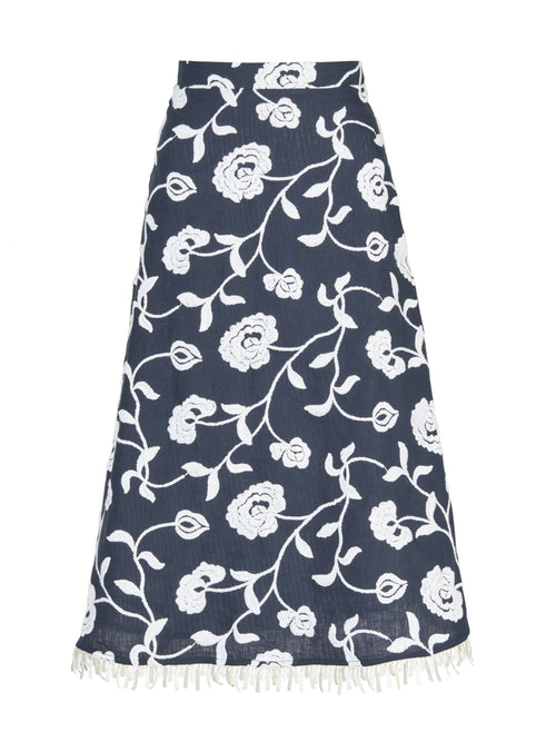 A Bianca Skirt Navy Embroidered with fringes in blue and white floral design.