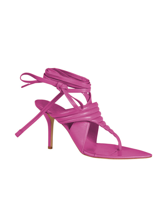 A Dalila Heels Magenta crafted from Italian calf leather with wraparound ankle straps, displayed against a white background.