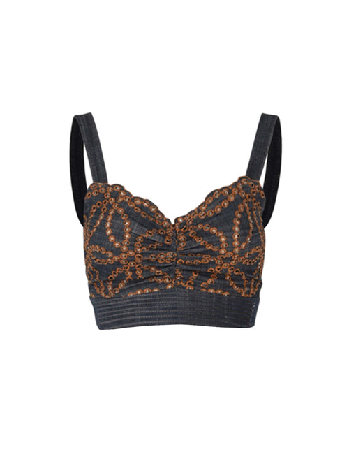 The Candance Top Chambray Embroidery is a black sleeveless crop top featuring intricate gold sequined designs and adjustable straps, accented with delicate floral motifs.