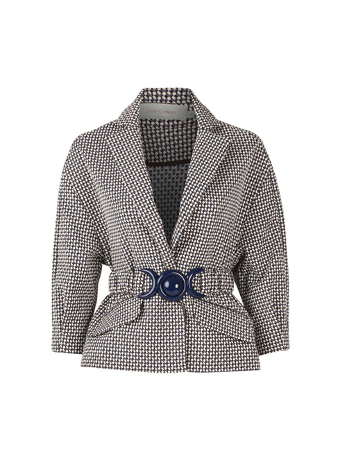 The Gianna Jacket in Celeste Geometric Print features a chic black and white houndstooth pattern, accented with a wide blue belt and a stylish peplum hem.