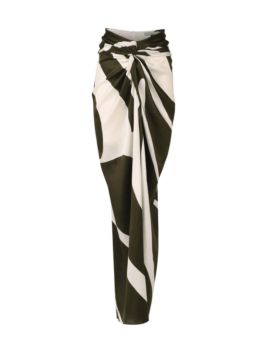 A black and white striped skirt on a mannequin in Marina Skirt Green Abstract Palm.