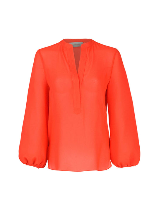 The Triora Blouse Tangerine is a lively tangerine-colored viscose top with a V-neckline, complemented by flowing long sleeves and relaxed cuffs, shown against a plain white background.