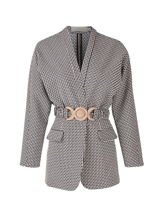 Black and white geometric print Vogogna jacket with a belted waist and large circular buckle, featuring a deep V-neck and front flap pockets.