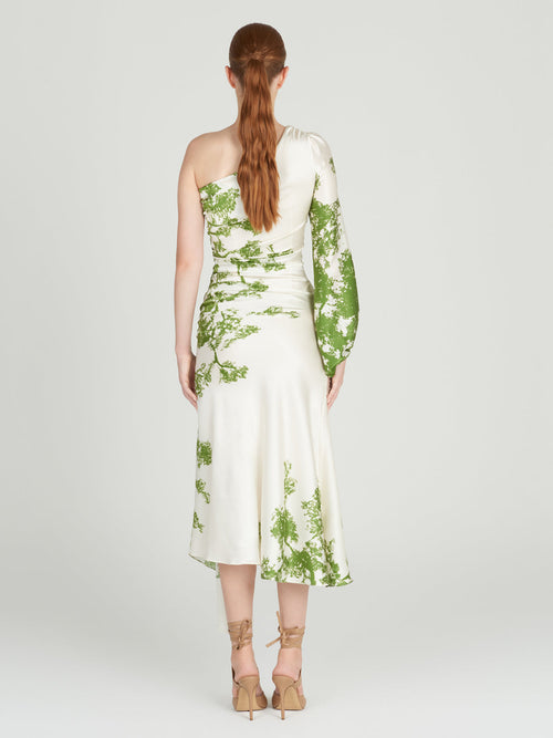 An asymmetrical Villanova Dress Green Cyprus silk dress with a sleeve.