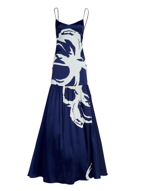 A Bari Dress Midnight Bloom with a floral design on it.