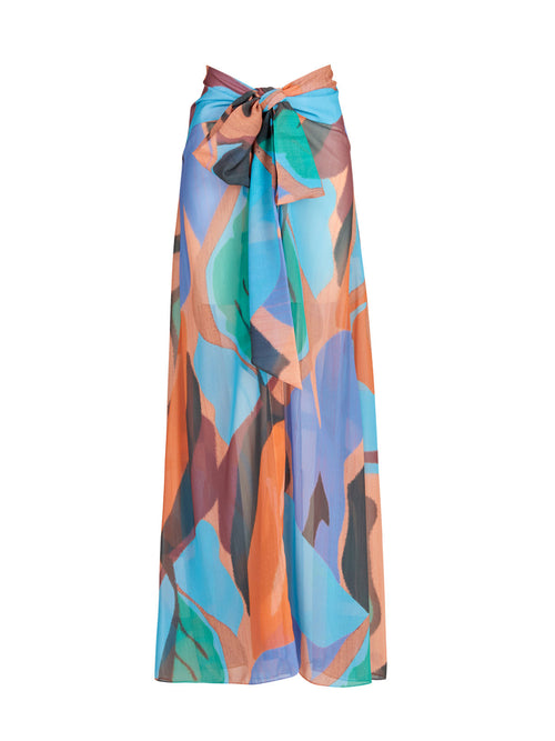 A woman's Cagliari Skirt Pareo Pastel Multi Swirls with a colorful print on it.