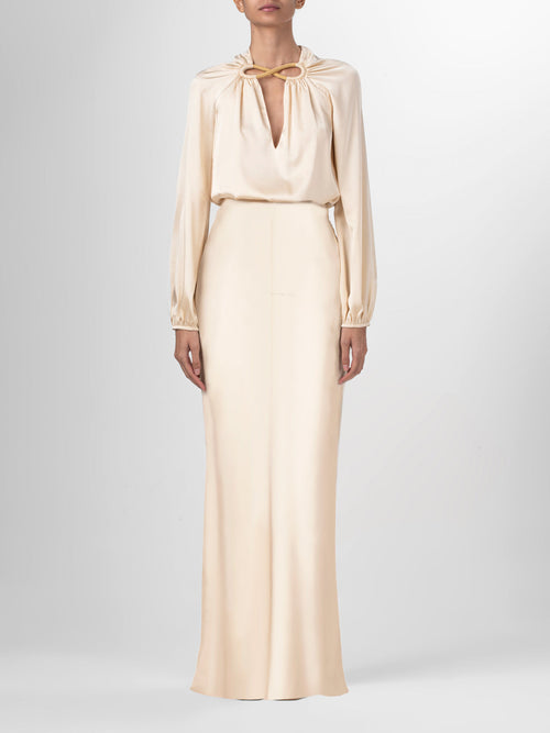 A solid color, Laurina Skirt Beige midi skirt on a white background.