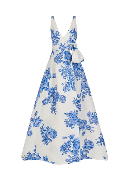 White sleeveless Logan Dress Blue Rose Motif with a bow on the shoulder, displayed against a white background.