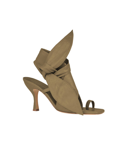 A pair of comfortable Marco Heel Olive Green sandals with a bow on the heel.