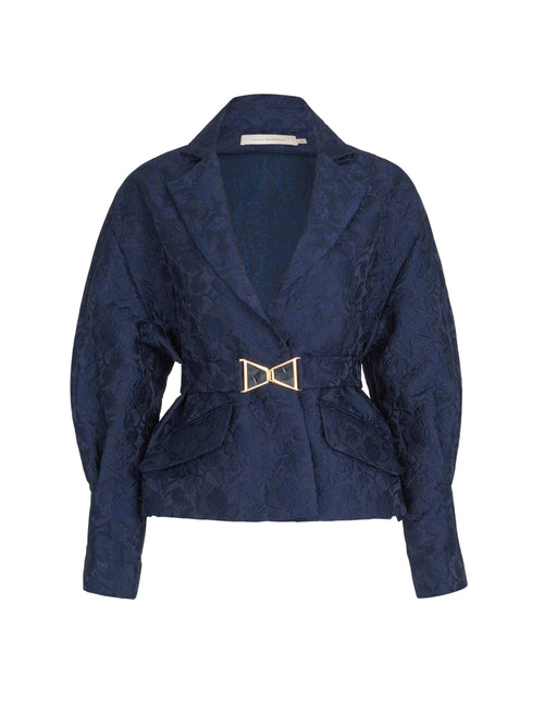 A Sorrento Jacket Navy with a gold buckle.
