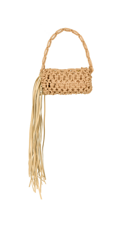 The Vinessa Handbag Ivory features a woven design in tan, accented with elegant fringe tassels made from Italian leather, cascading gracefully from one side and complemented by a chic loop handle.